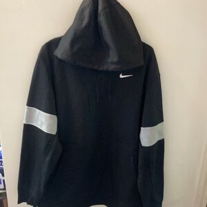 NIKE XL black with gray accents on sleeve. Swish is white.